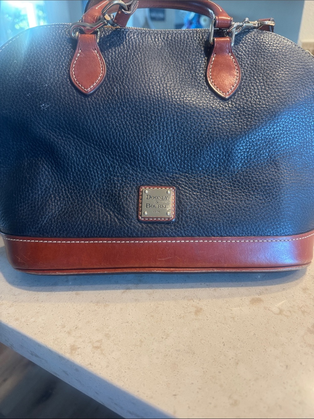 Dooney & Bourke Black Pebbled Leather Duffel with Brown Trim